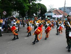 Kirab Drumband Yonif 320/BP Meriahkan Peringatan HUT TNI ke-77