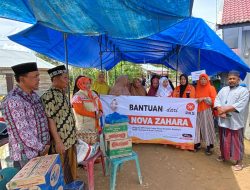 NOVA ZAHARA ANGGOTA DPR ACEH TEROBOS BANJIR UNTUK BANTU WARGA.