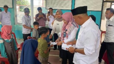 Pemerintah Pekon Puramekar,Salurkan peneriama Santunan Anak Yatim Piatu, Dalam Kecerian dan Peduli.