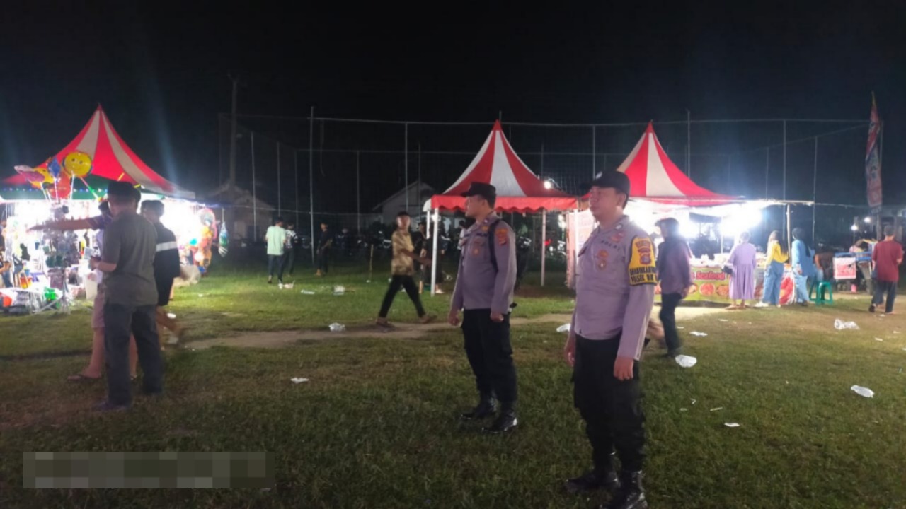 Cegah Ganguan Kamtibmas, Polsek Way Tuba Lakukan Patroli KRYD di Pasar Malam.